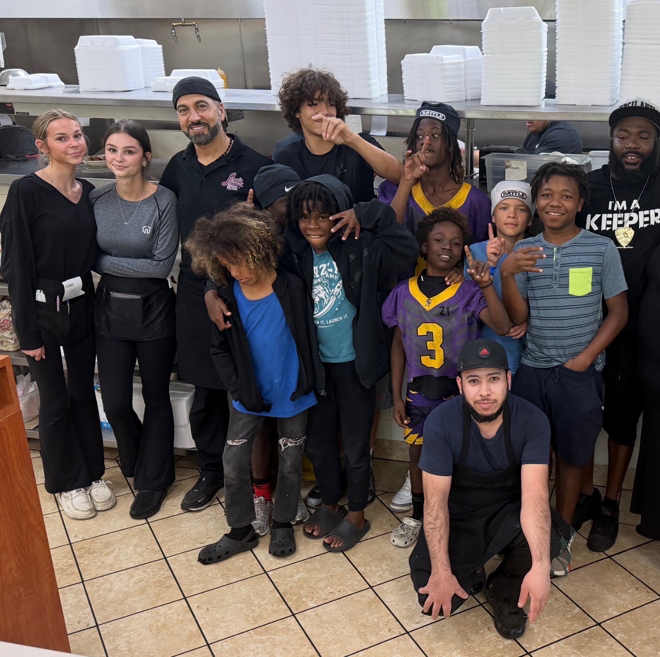 Youth and local business partners after a community service shift